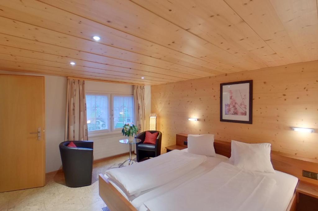 Postel nebo postele na pokoji v ubytování Hotel Frohe Aussicht