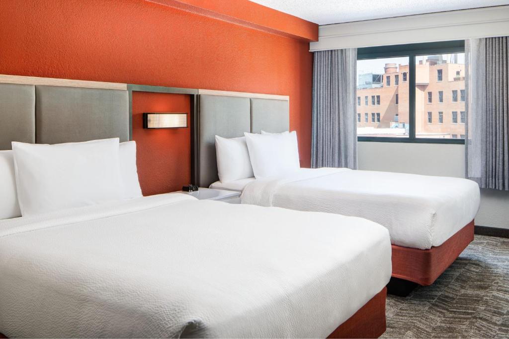 Voodi või voodid majutusasutuse SpringHill Suites by Marriott Dallas Downtown / West End toas