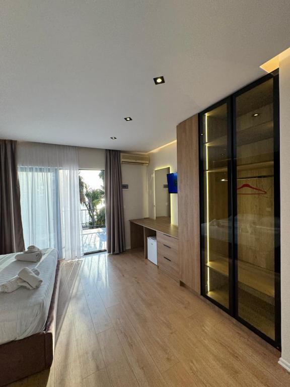 Postel nebo postele na pokoji v ubytování Hotel Sanremo Vlore