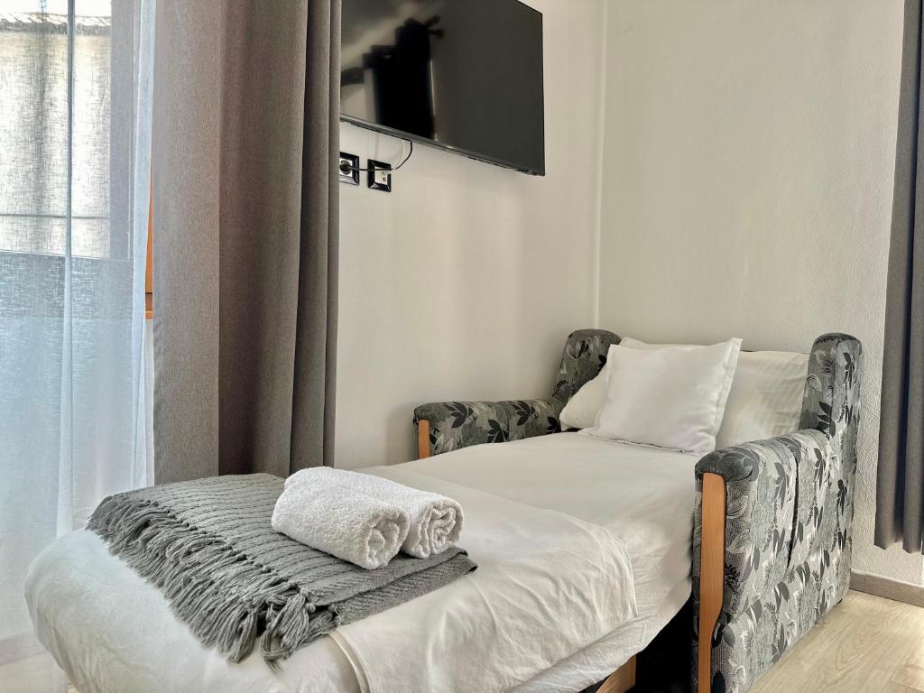 Postel nebo postele na pokoji v ubytování Kelly's Rooms