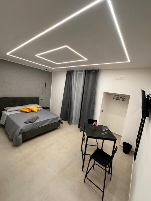 Postel nebo postele na pokoji v ubytování Dalyrooms suite