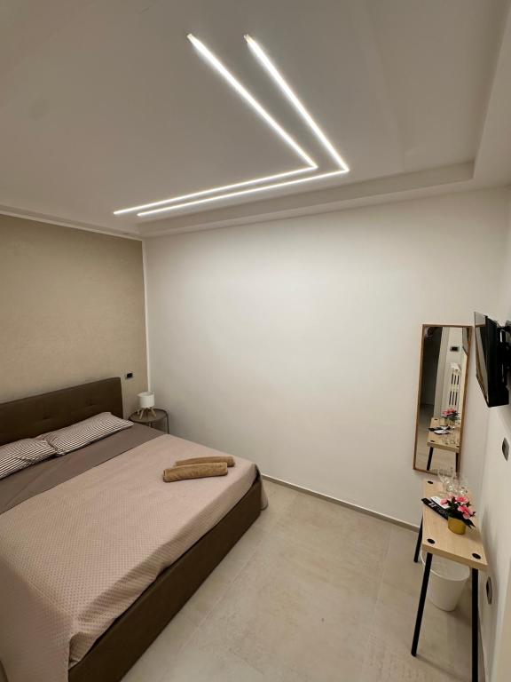 Postel nebo postele na pokoji v ubytování Dalyrooms suite
