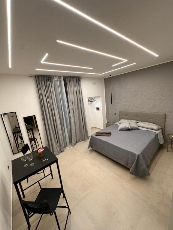 Postel nebo postele na pokoji v ubytování Dalyrooms suite