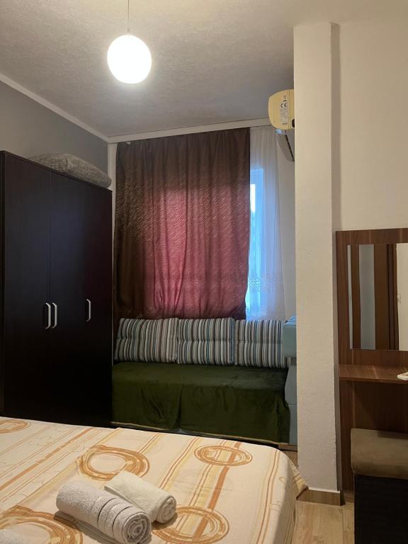 Postel nebo postele na pokoji v ubytování Apartments Murati
