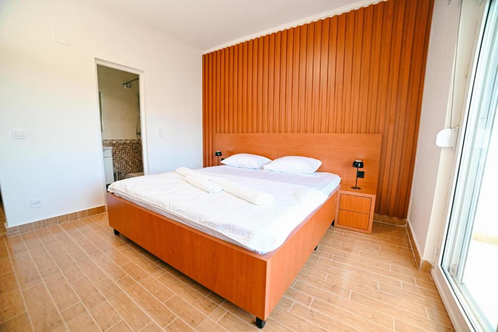 Voodi või voodid majutusasutuse Hotel Ariana Lux toas