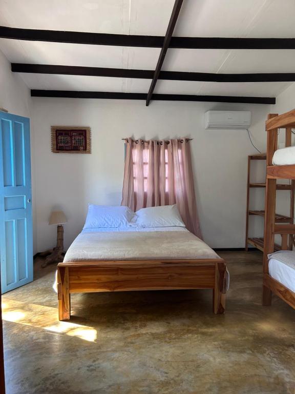 Postel nebo postele na pokoji v ubytování Casa Maya