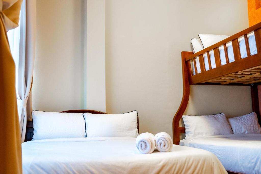 Postel nebo postele na pokoji v ubytování Hotel Casa Agave