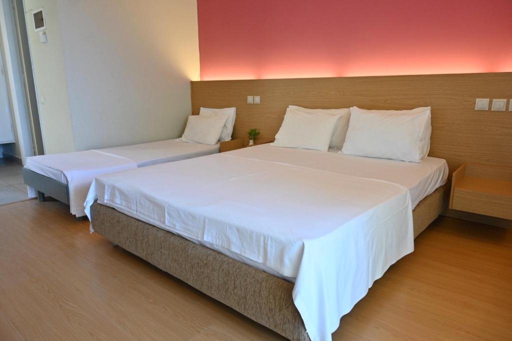 Postel nebo postele na pokoji v ubytování Angel Hotel