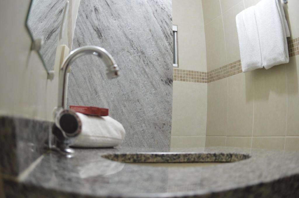Koupelna v ubytování Richard Hotel