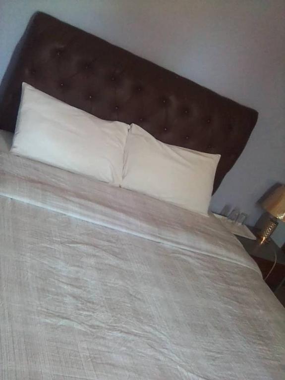 Postel nebo postele na pokoji v ubytování Faigib Guest House