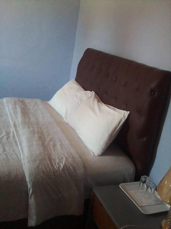 Postel nebo postele na pokoji v ubytování Faigib Guest House