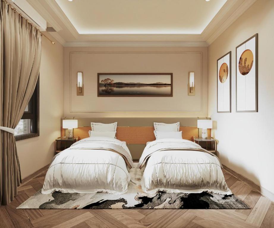 Postel nebo postele na pokoji v ubytování San Hanoi Hotel & Spa