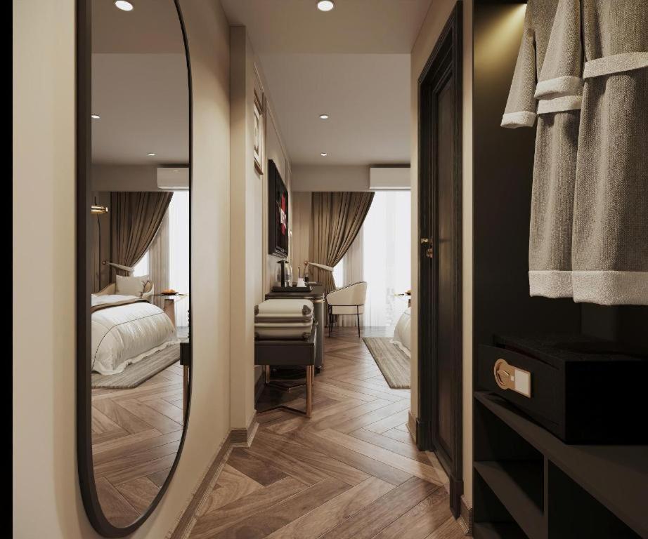 Postel nebo postele na pokoji v ubytování San Hanoi Hotel & Spa