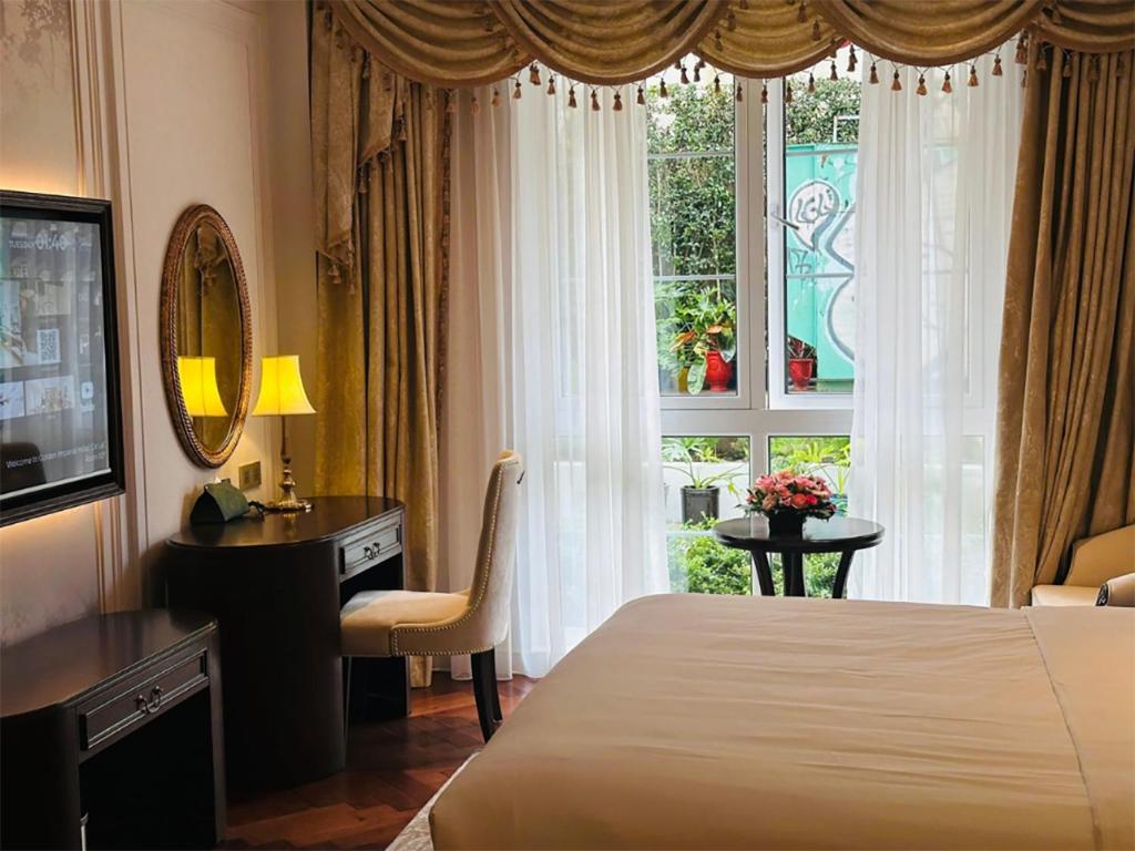 Giường trong phòng chung tại Golden Sun Hotel - Dalat