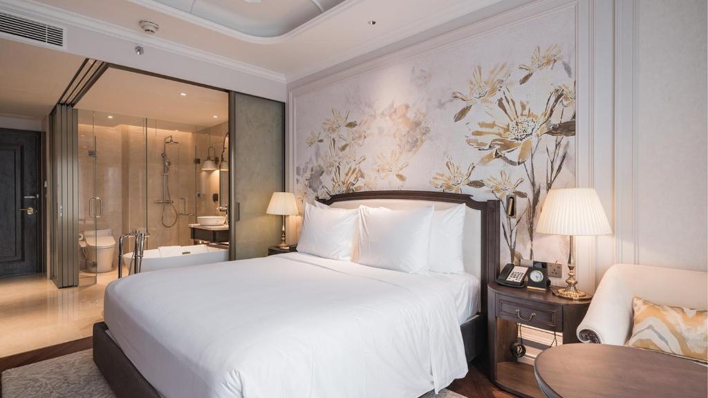 Giường trong phòng chung tại Golden Sun Hotel - Dalat