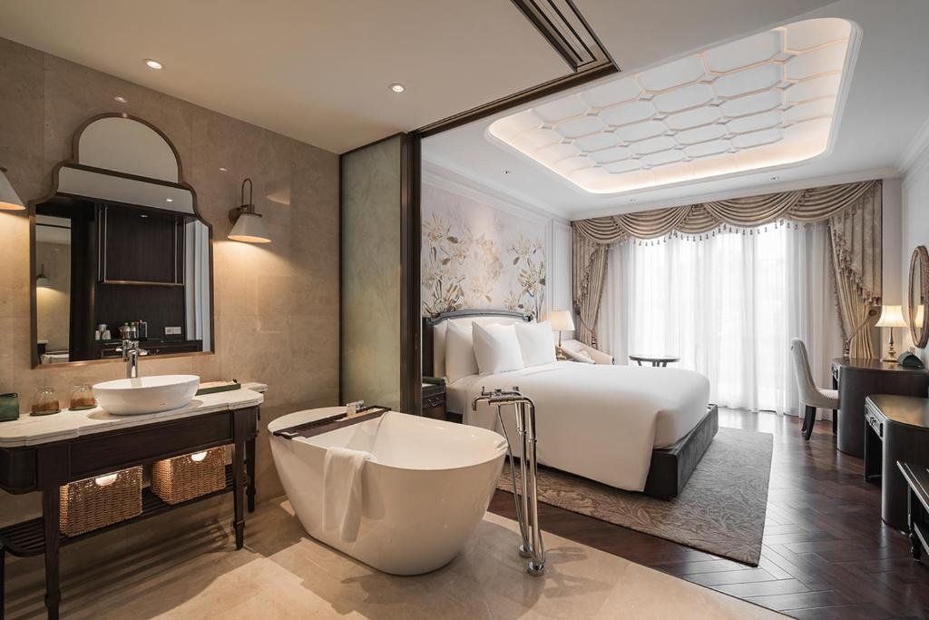 Giường trong phòng chung tại Golden Sun Hotel - Dalat