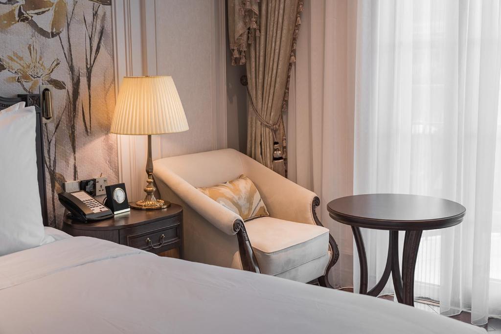 Giường trong phòng chung tại Golden Sun Hotel - Dalat