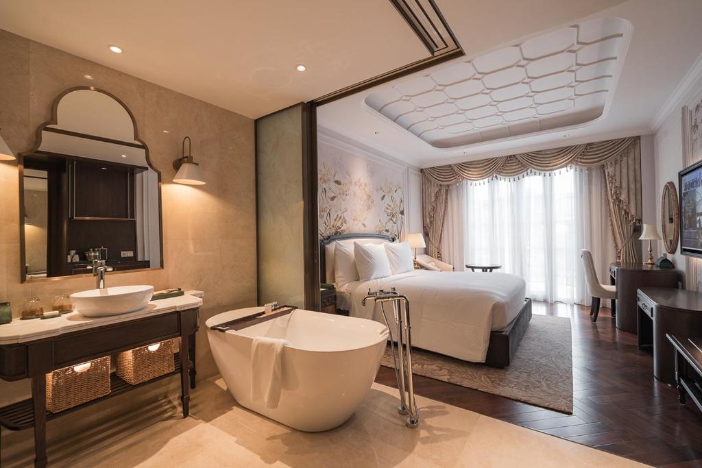 Giường trong phòng chung tại Golden Sun Hotel - Dalat