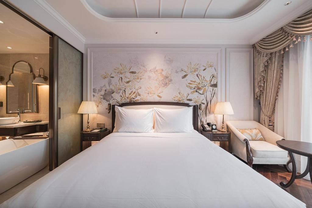 Giường trong phòng chung tại Golden Sun Hotel - Dalat
