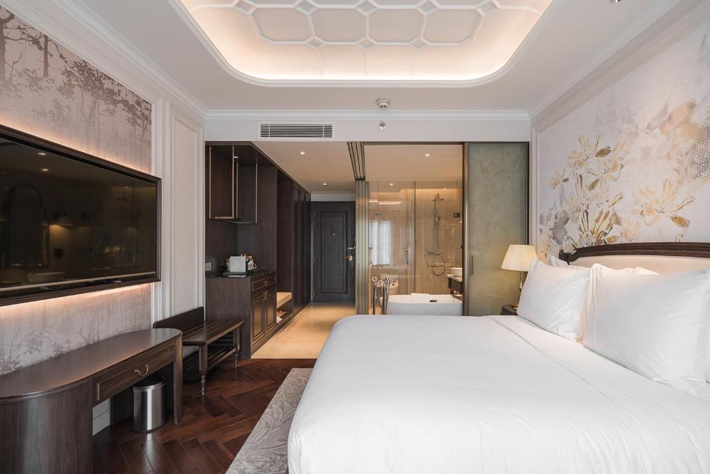 Giường trong phòng chung tại Golden Sun Hotel - Dalat