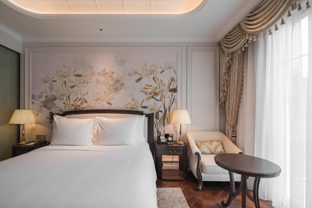 Giường trong phòng chung tại Golden Sun Hotel - Dalat
