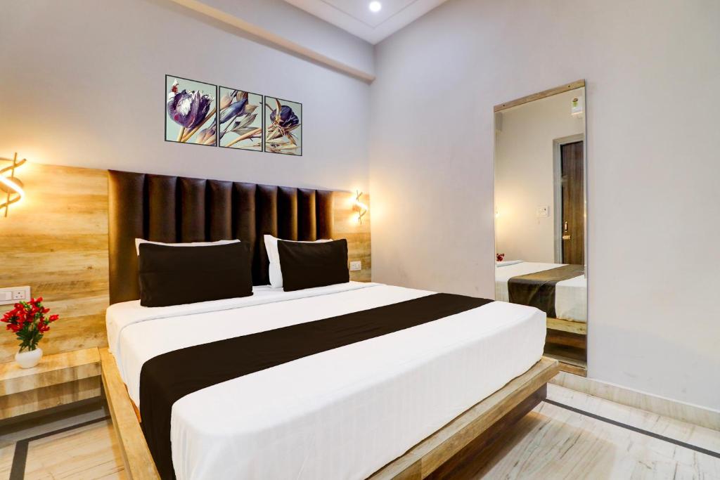 Postel nebo postele na pokoji v ubytování Super Hotel O Gold Inn