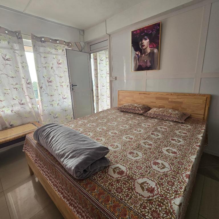 Postel nebo postele na pokoji v ubytování Green Discovery B&B Tamarind Falls 7 Cascades