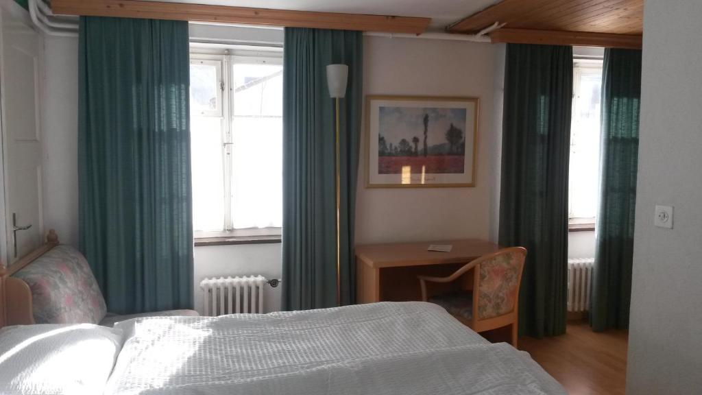 Postel nebo postele na pokoji v ubytování Hotel Danis