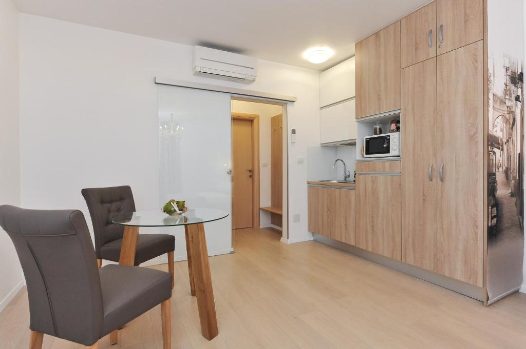 Kuchyňa alebo kuchynka v ubytovaní Luka Residence Apartments