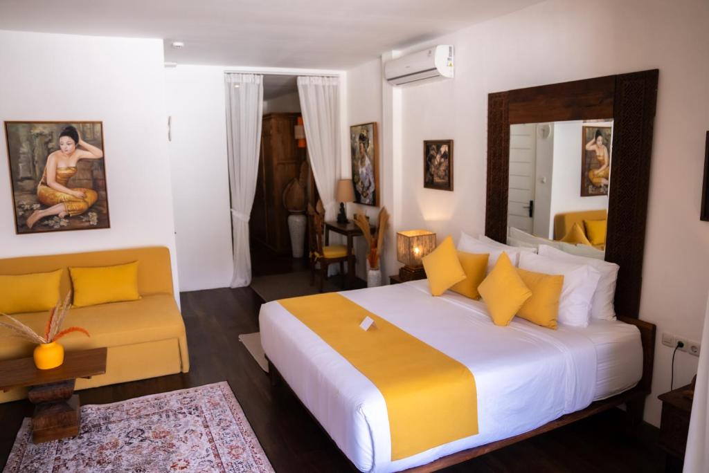 Postel nebo postele na pokoji v ubytování Antana Hotel