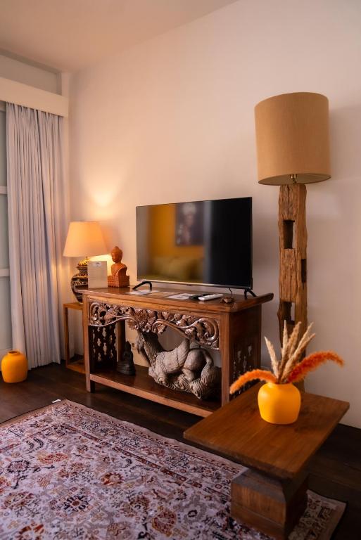 TV a/nebo společenská místnost v ubytování Antana Hotel