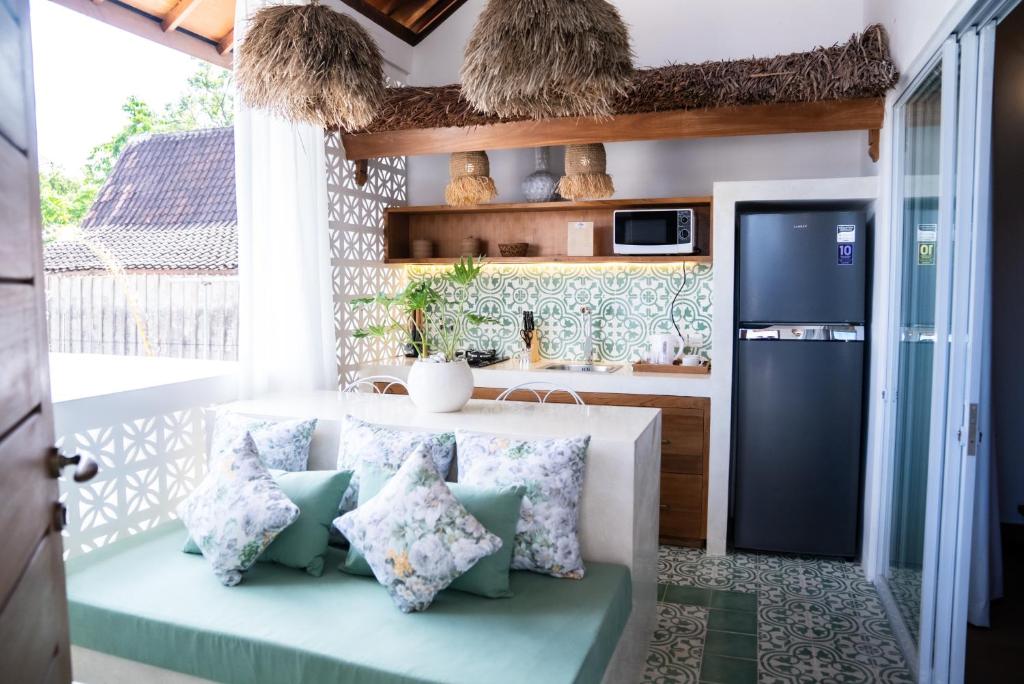 Kuchyň nebo kuchyňský kout v ubytování Antana Hotel