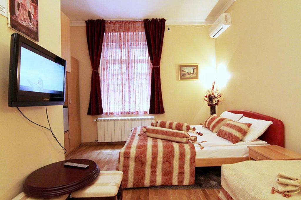 Postel nebo postele na pokoji v ubytování Villa Forever