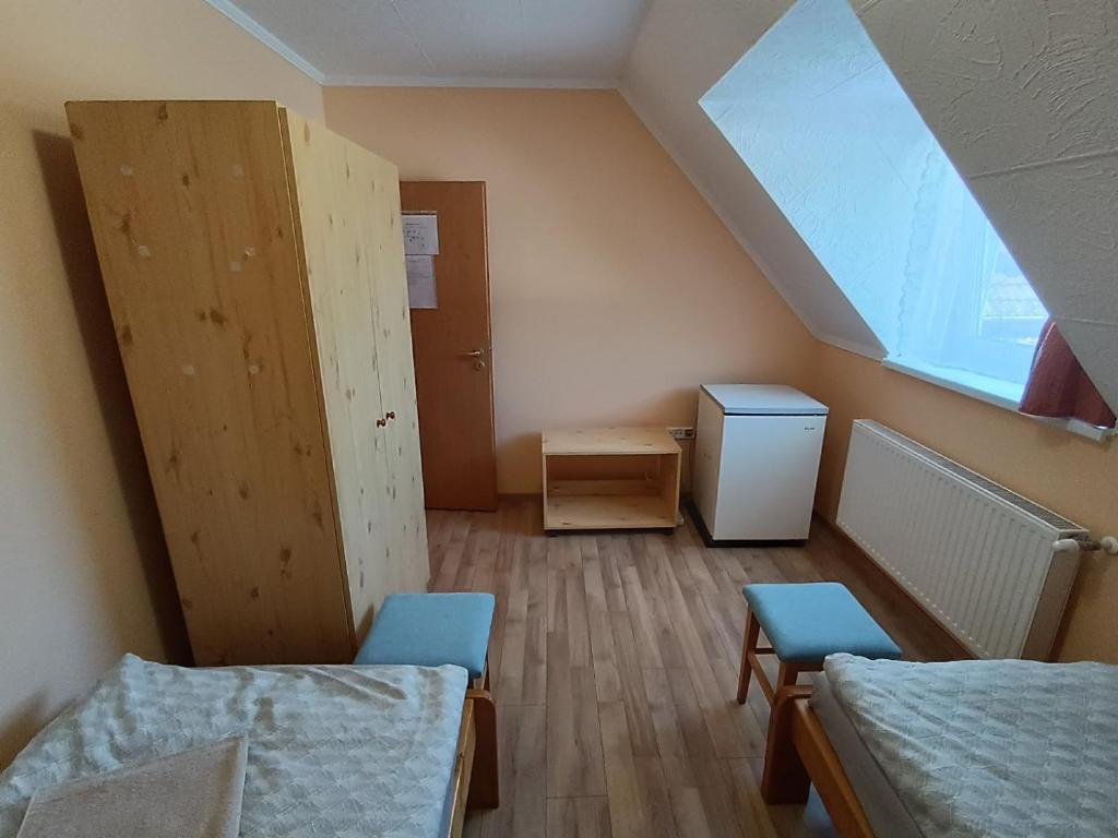 Postel nebo postele na pokoji v ubytování Kettős Csárda Szálláshely Bocfölde