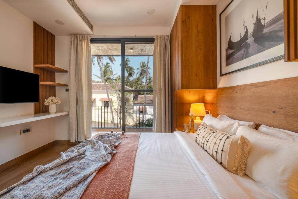 Un pat sau paturi într-o cameră la SaffronStays Vegas