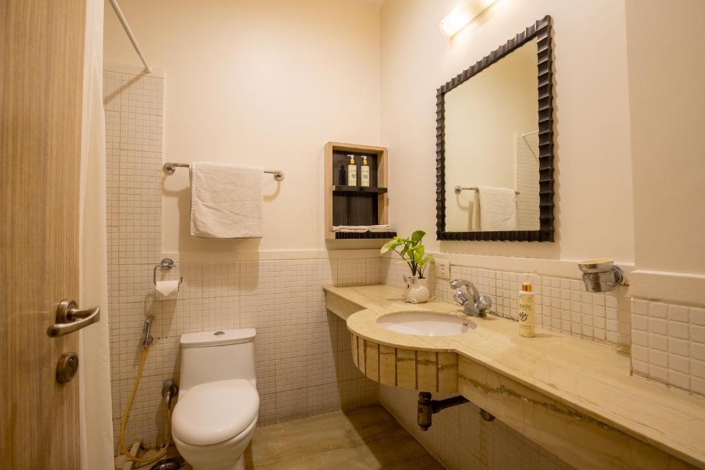 Koupelna v ubytování BedChambers Serviced Apartments, Sector 40