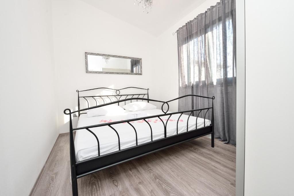 Posteľ alebo postele v izbe v ubytovaní Holiday home Jakov