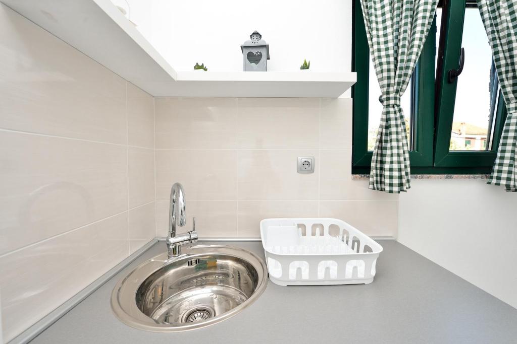 Kúpeľňa v ubytovaní Holiday home Jakov