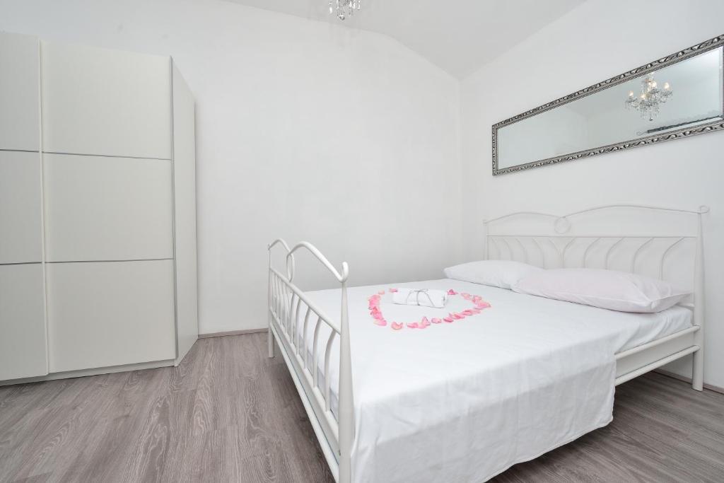 Posteľ alebo postele v izbe v ubytovaní Holiday home Jakov