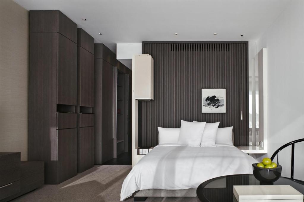 Postel nebo postele na pokoji v ubytování Park Hyatt Shanghai