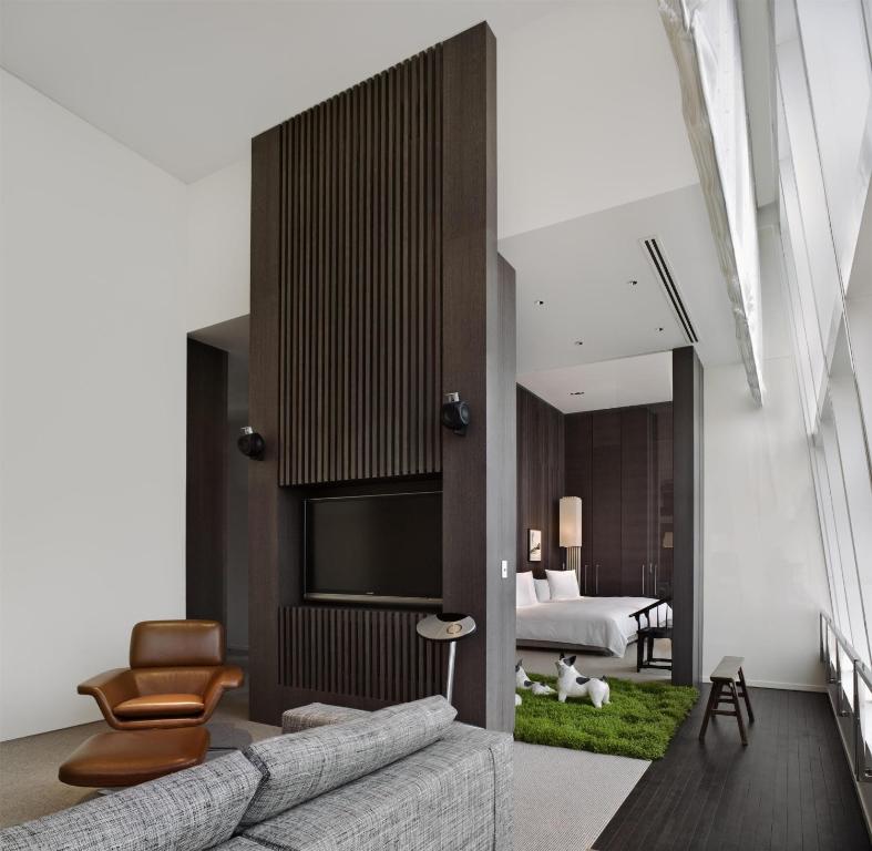Postel nebo postele na pokoji v ubytování Park Hyatt Shanghai