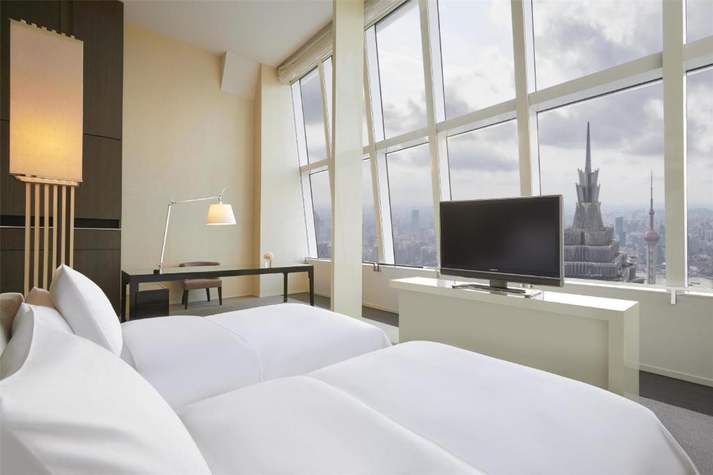 TV a/nebo společenská místnost v ubytování Park Hyatt Shanghai