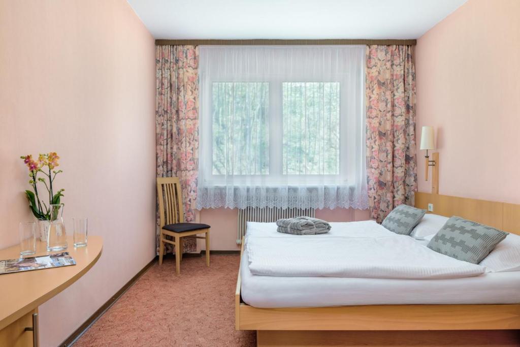 Postel nebo postele na pokoji v ubytování Gasthof Rupp