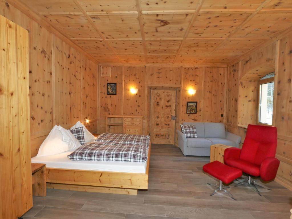 A bed or beds in a room at Apartment building, Fügen