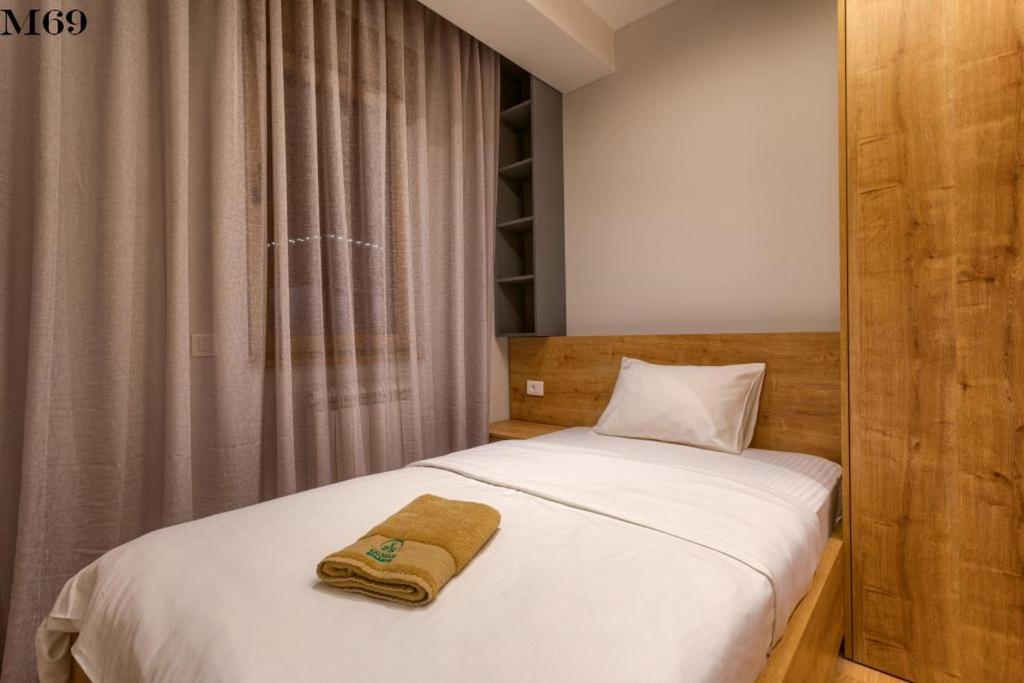 Postel nebo postele na pokoji v ubytování Kalman SPA&GYM