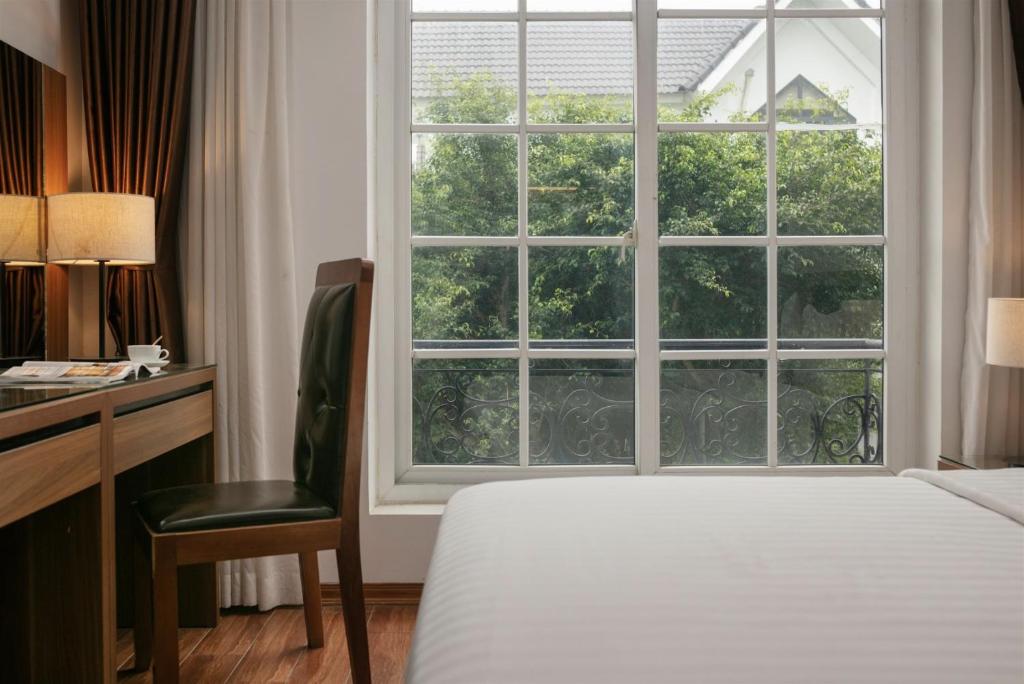 Postel nebo postele na pokoji v ubytování Lam Anh Hotel 2 Dương Nội Hà Đông
