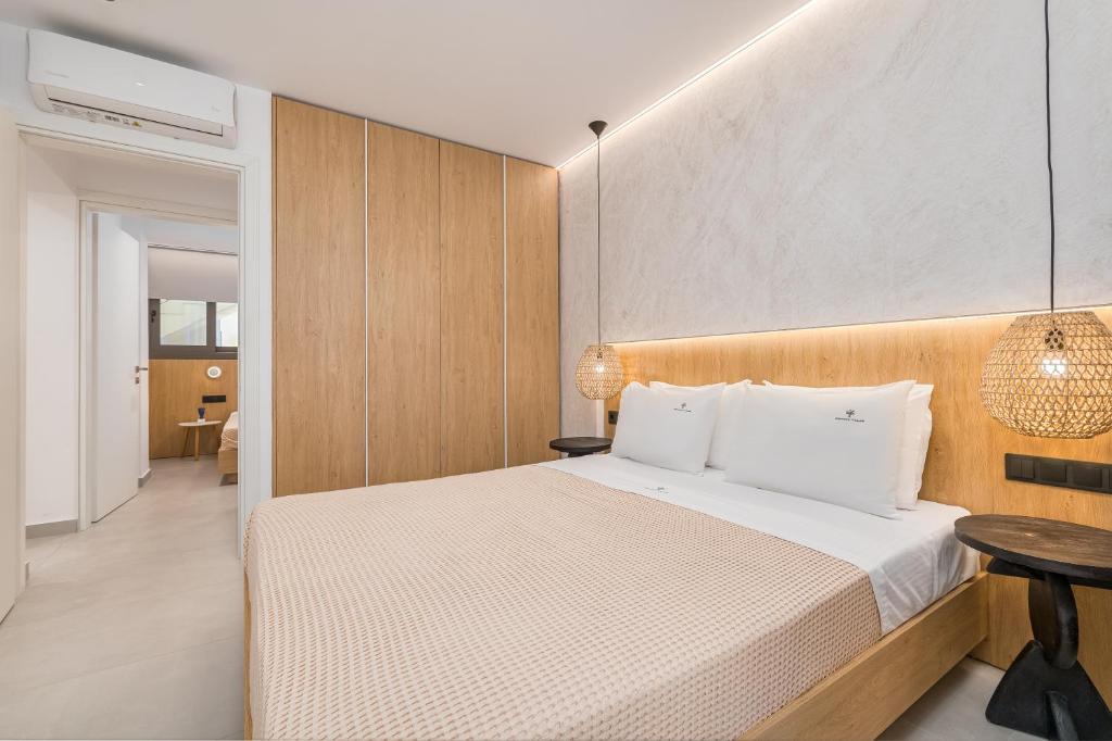Posteľ alebo postele v izbe v ubytovaní Dionisos Resort