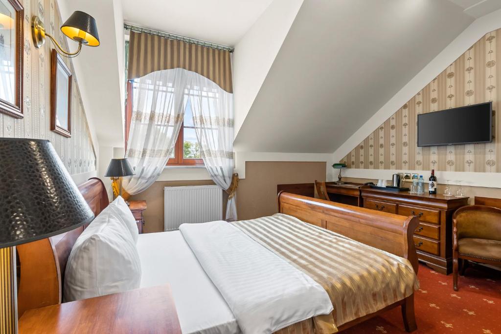 TV a/nebo společenská místnost v ubytování Hotel Diament Arsenal Palace Katowice - Chorzów