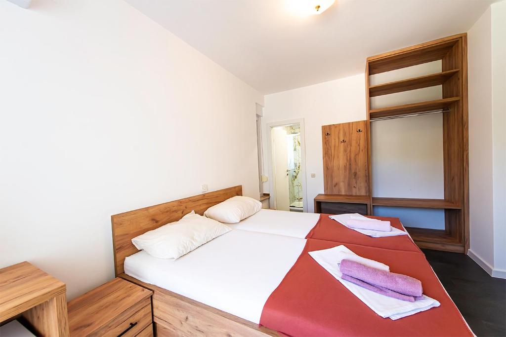 Postel nebo postele na pokoji v ubytování Villa Christina