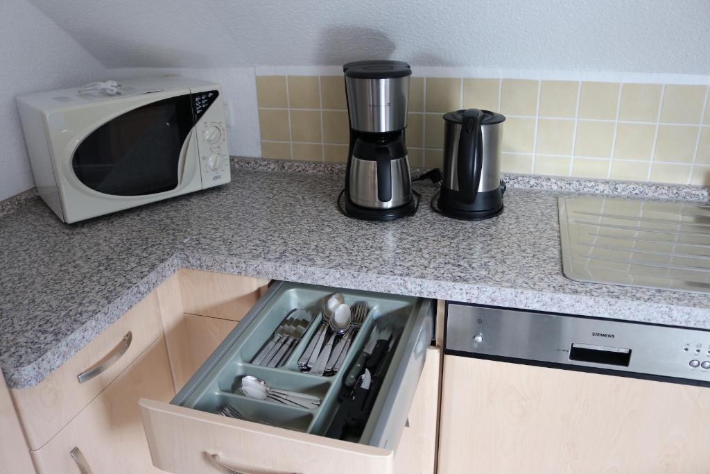 Kuchyň nebo kuchyňský kout v ubytování Haus Sum